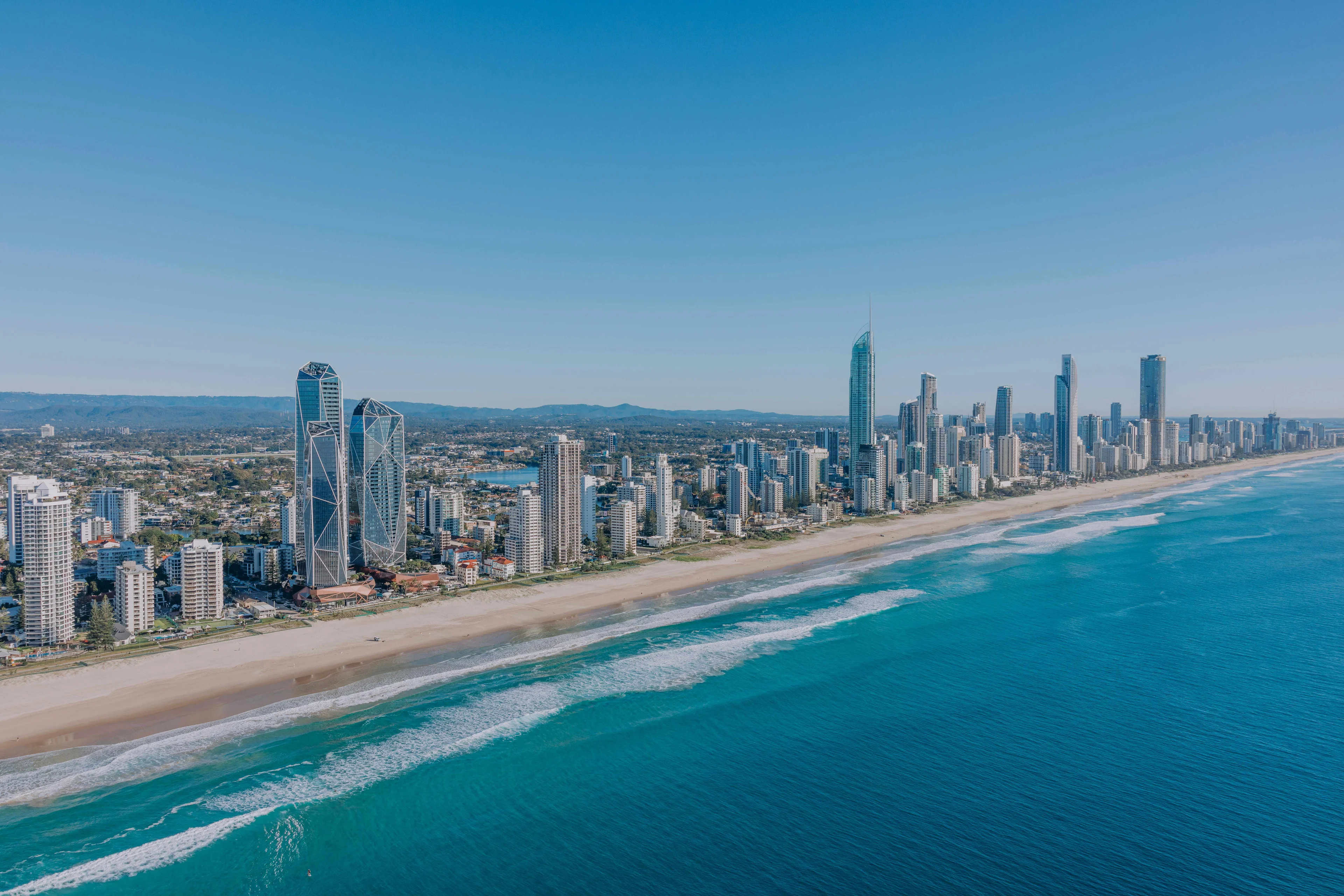 The Gold Coast coastline looking north along the beach towards the Surfers Paradise skyline